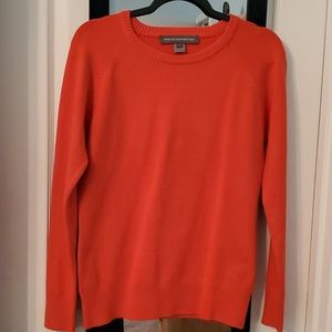 French Connection orange sweater.